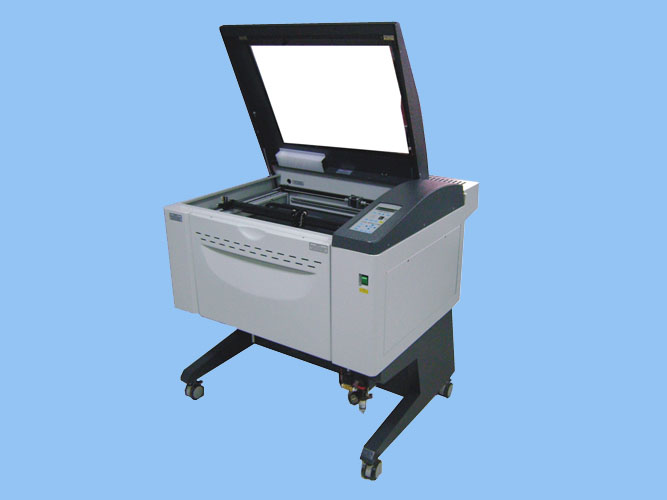 Laser engraving and cutting machine